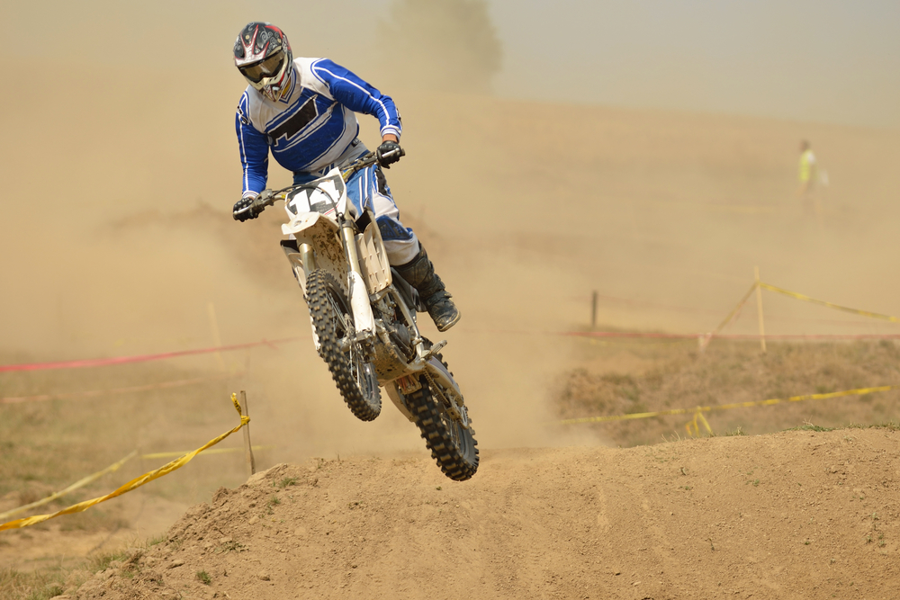 motocross bike in a race representing concept of speed and power in extreme man sport